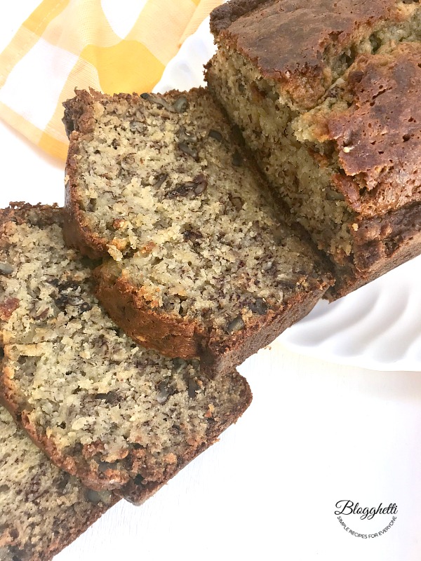 Perfect Banana Bread sliced on white platter