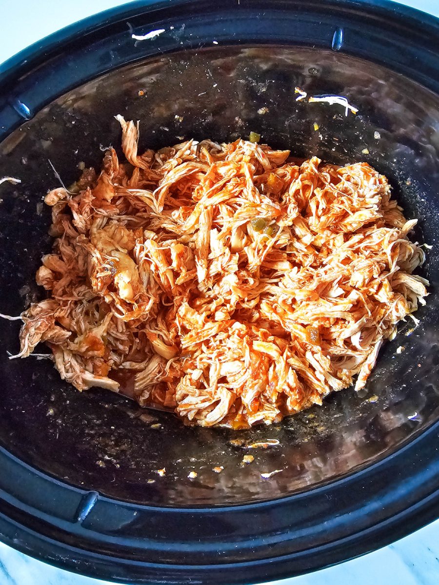 add chicken back to slow cooker