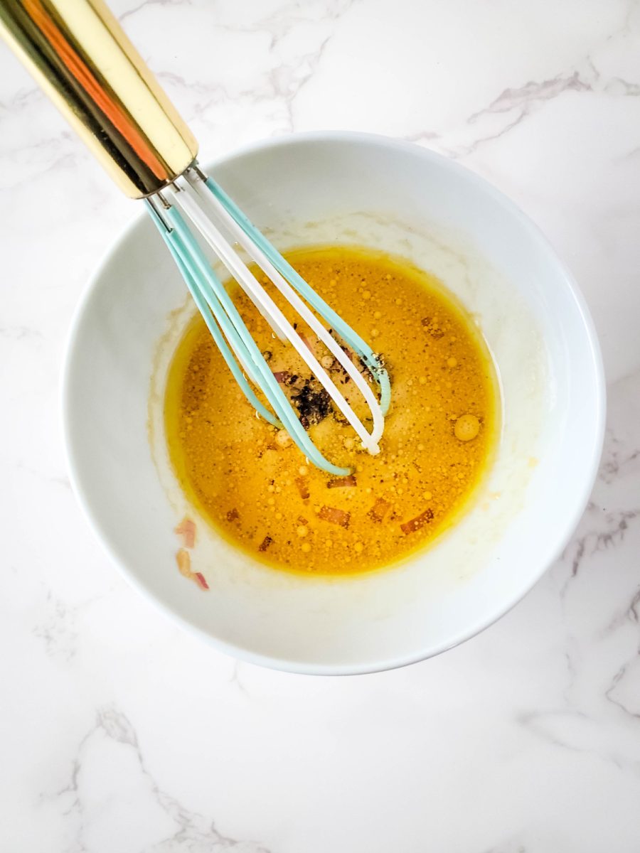 red wine vinaigrette in bowl with whisk