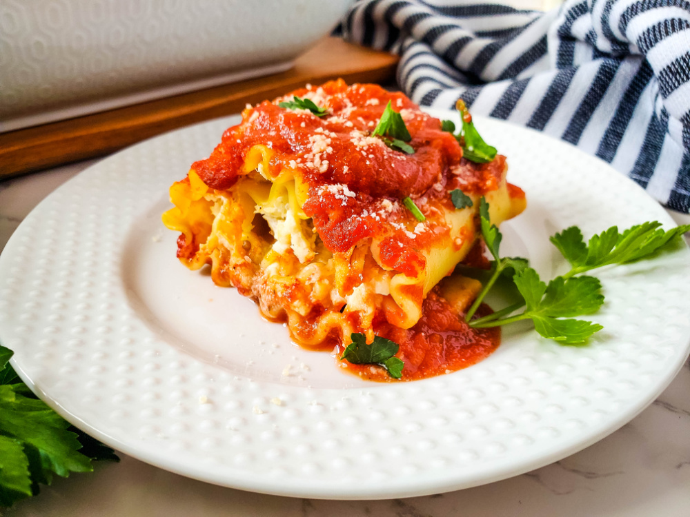 close up of easy chicken lasagna roll up