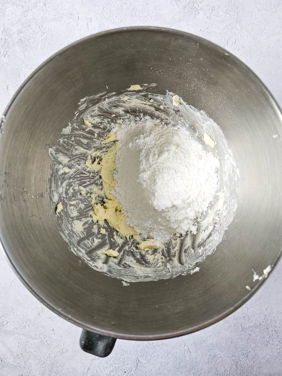 cream butter and add powdered sugar