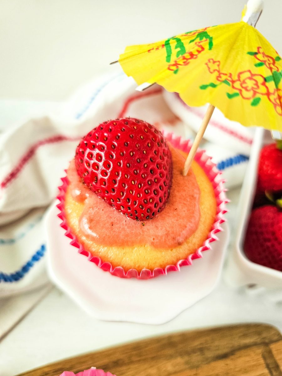 strawberry filled cupcake with strawberry curd