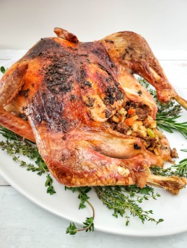 herb and butter oven roasted turkey with stuffing