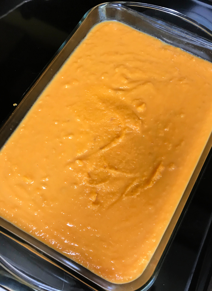 sweet potato mixture in baking dish ready for topping