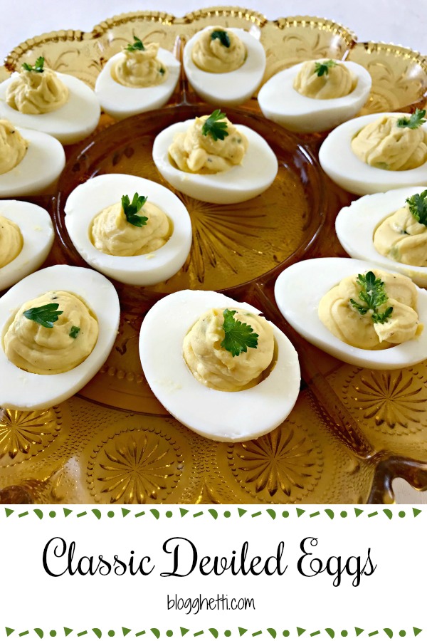 Classic Deviled Eggs are a must-have at most holidays, Easter, potlucks, and other gatherings. With just 5 main ingredients to the filling, deviled eggs are easy and quick to make. #deviledeggs #eggs
