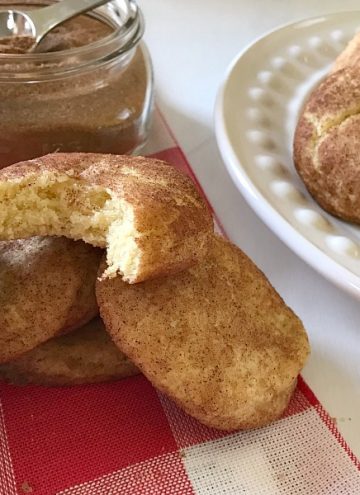 These soft and chewy Snickerdoodle Cookies are buttery and covered in cinnamon and sugar. A classic cookie recipe that is a family favorite. #Snickerdoodle #Cookies