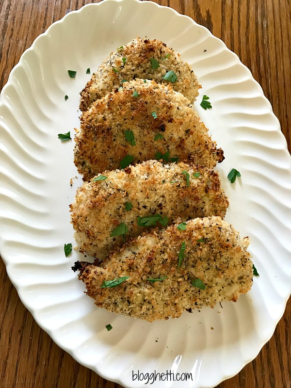 The best oven fried chicken - Crispy seasoned Panko coating on the outside and moist and tender inside. BAKED, not fried which makes clean up a breeze.