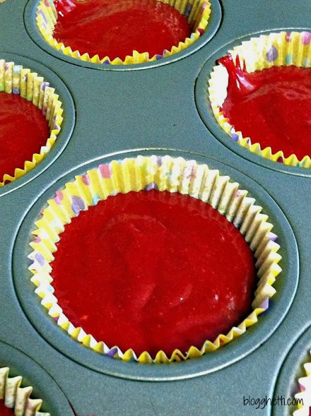 These Red Velvet cupcakes are dramatic in color with their bright red color and topped with cream cheese frosting. The cupcakes have a mild chocolate flavor and are so moist. The mild chocolate flavor comes from adding a small amount of cocoa powder to the batter and buttermilk gives it an extra moist touch.