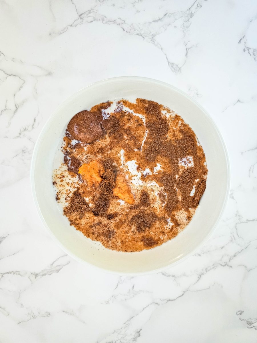 ingredients in a bowl for the pumpkin mixture