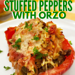 Spicy Sausage Stuffed Peppers with Orzo with text overlay