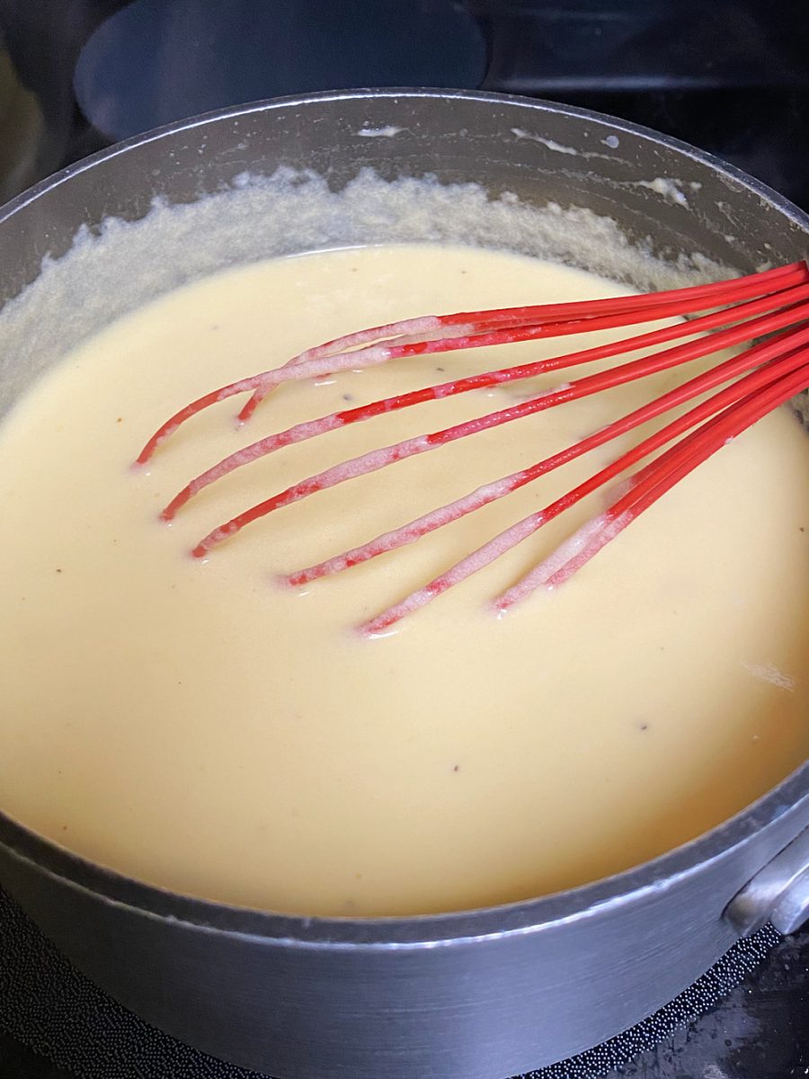 whisk cheese sauce till smooth and cheese is melted