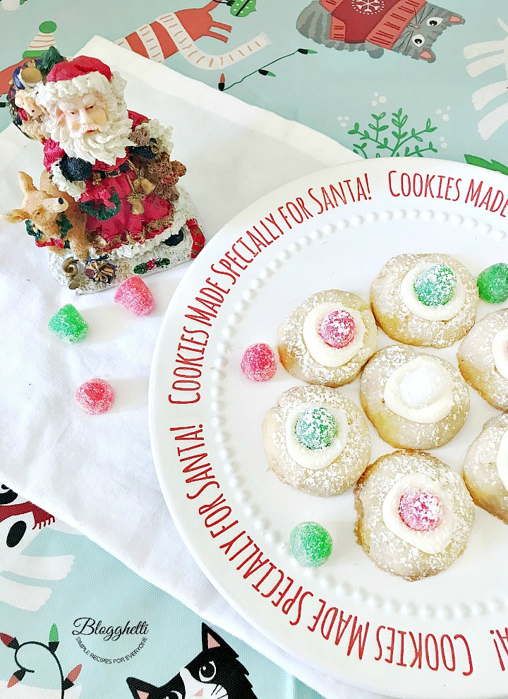 Sugar plum thumbprint cookies on Santa plate