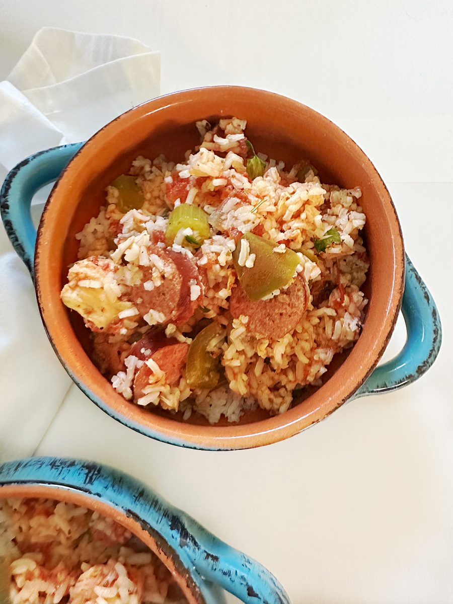 blue bowl with rice chicken and sausage