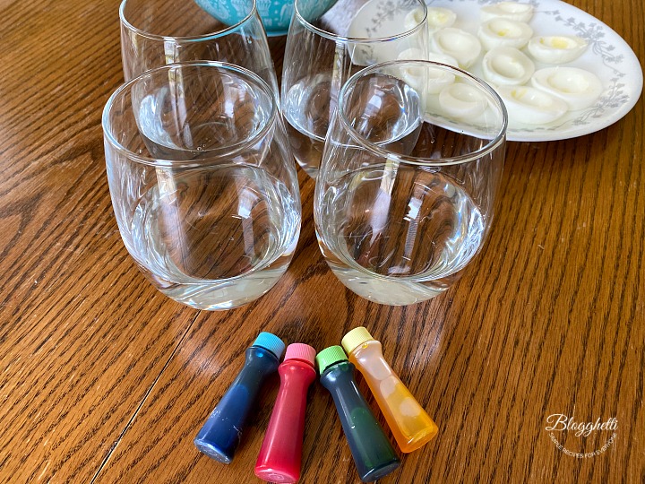 pastel food coloring and glasses for dying eggs