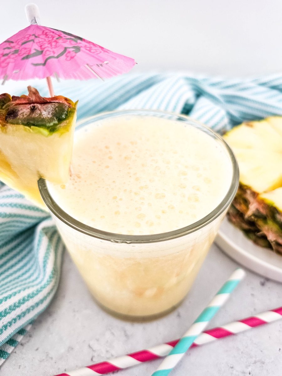 This Pineapple Crush Smoothie uses just 4 ingredients to create a delicious and healthy smoothie with a tropical vibe to enjoy any time of the day.