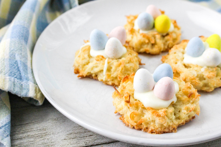springtime coconut macaroon nests on white plate