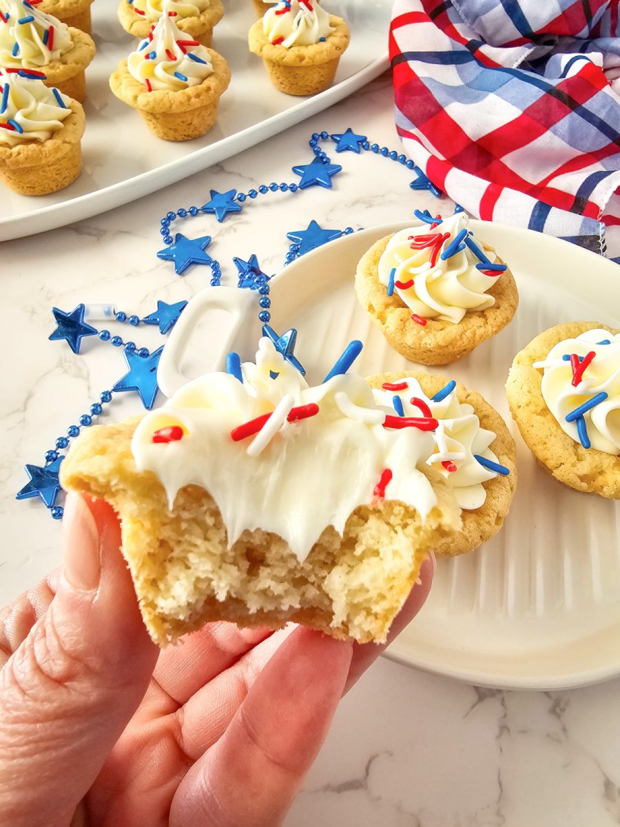 Patriotic Cookie Cup in hand with bite taken