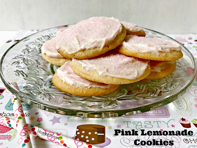 Pink lemonade concentrate gives these Pink Lemonade Cookies a tart treat inside and out. Frosted with a quick homemade icing and sprinkled with pink sugar crystals, the cookies will be a hit for a refreshing sweet summertime treat.