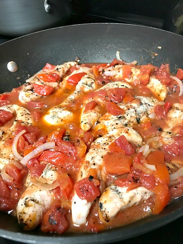 Simmering sauce and chicken