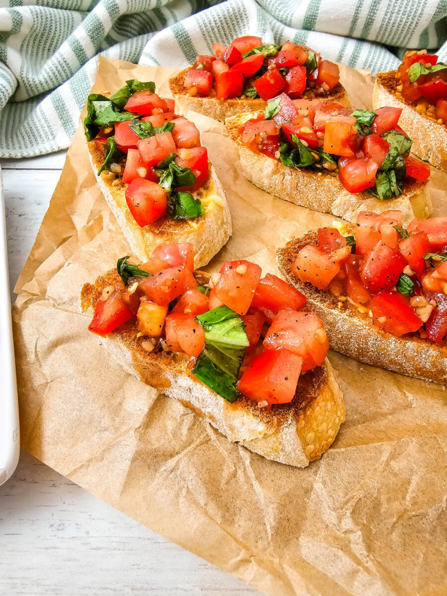 Toasted Parmesan bread topped with a fresh tomato, basil, garlic, and balsamic mixture.