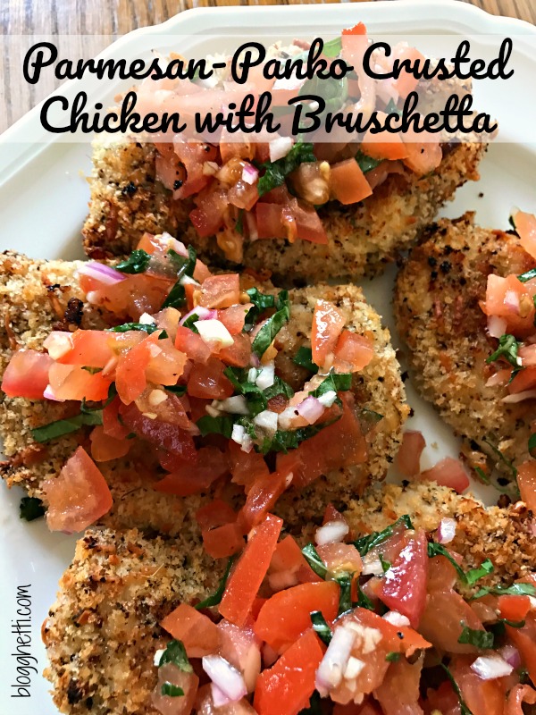 This Parmesan-Panko Crusted Chicken with Tomatoes and Basil recipe is oven fried which means less mess and healthier for you. Topped with garden fresh tomatoes, garlic, and basil, this chicken dish will not disappoint.