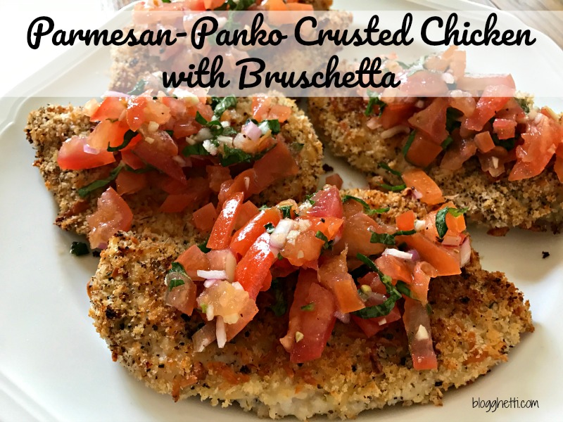 This Parmesan-Panko Crusted Chicken with Tomatoes and Basil recipe is oven fried which means less mess and healthier for you. Topped with garden fresh tomatoes, garlic, and basil, this chicken dish will not disappoint.