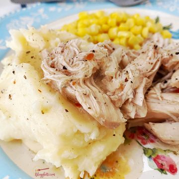 close up of Italian Chicken with mashed potatoes and corn