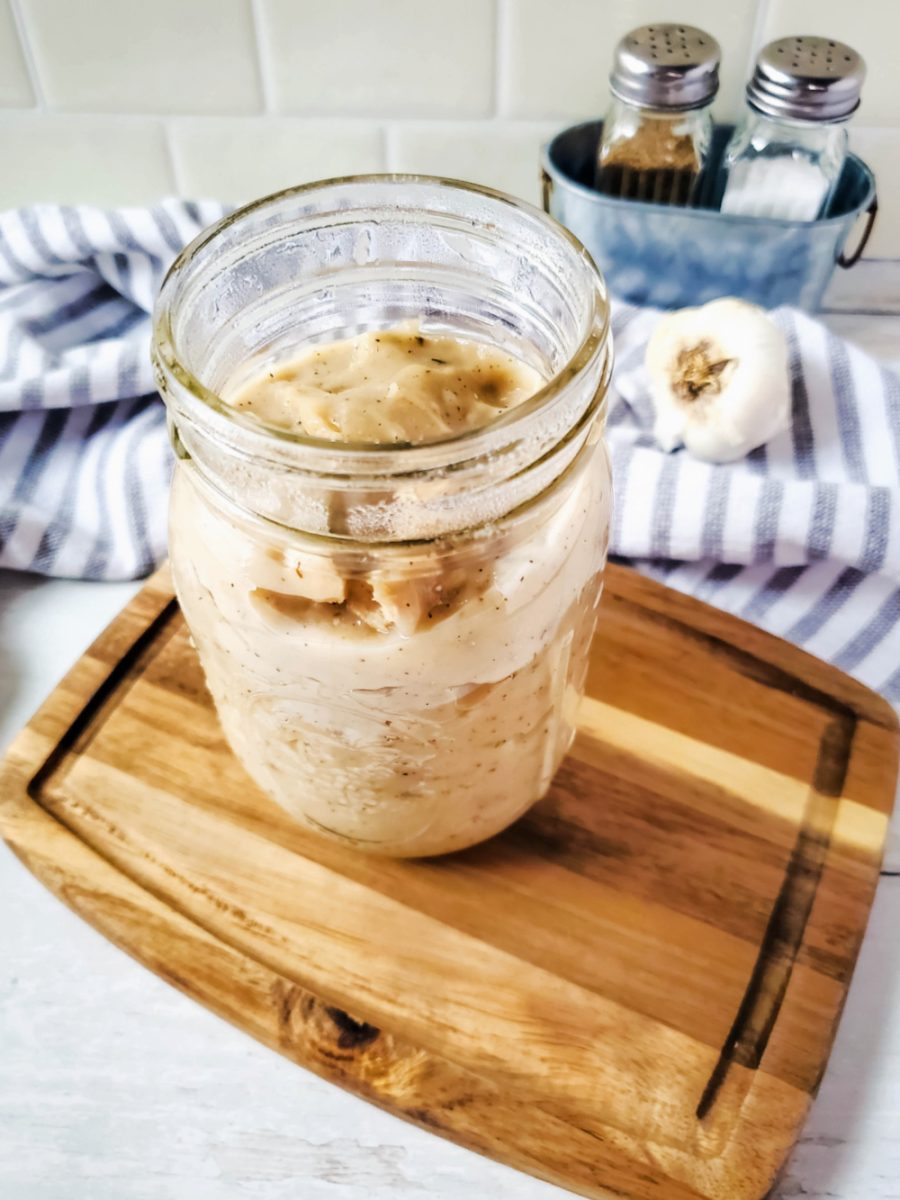 glass jar filled with homemade condensed cream of chicken soup