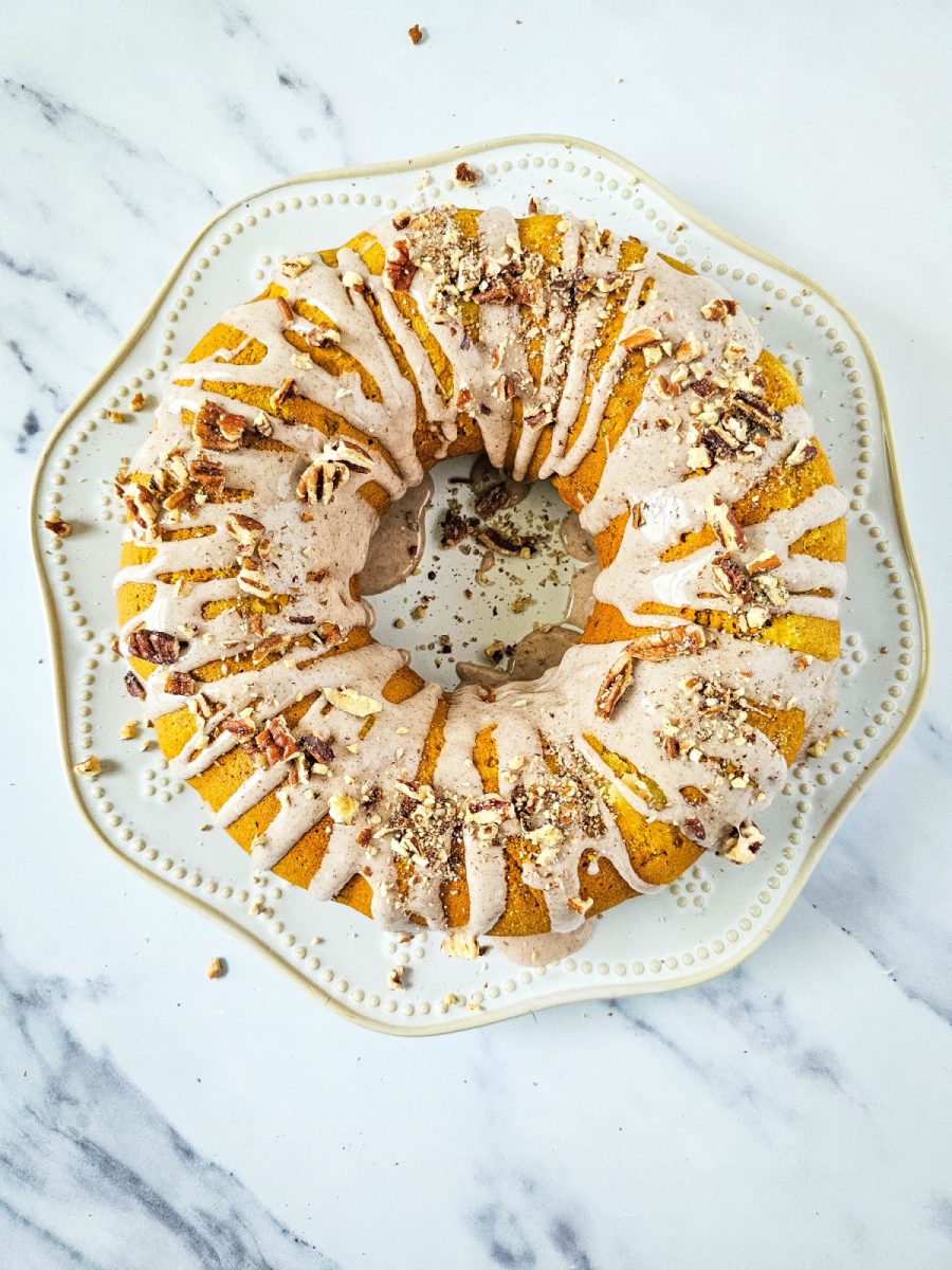 top cake with chopped pecans