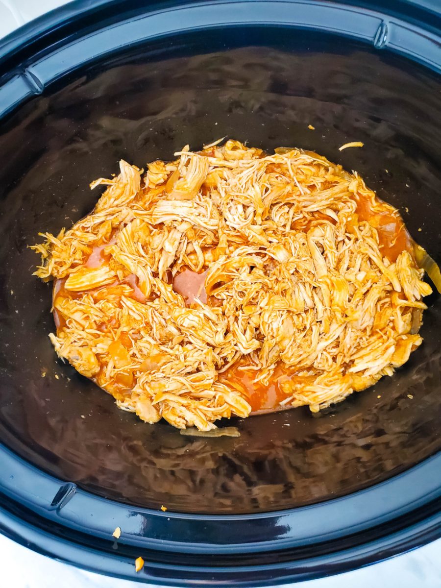 cook shredded chicken in sauce for another hour in slow cooker