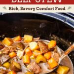 Pinterest graphic for Slow Cooker Beef Stew showing the stew inside a black slow cooker with a ladle holding beef, carrots, potatoes, and celery. Text reads “Slow Cooker Beef Stew” with “Rich, Savory Comfort Food.”