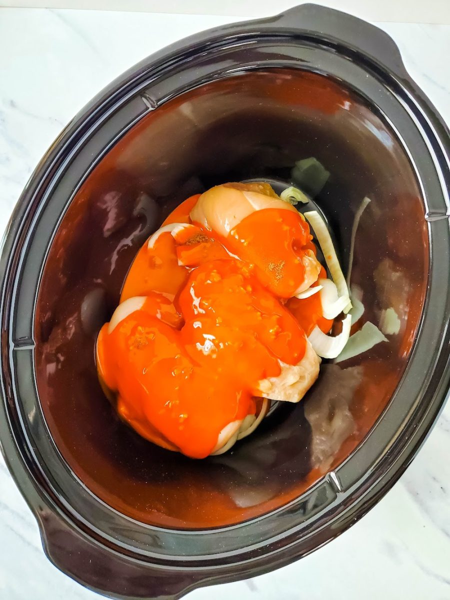 mix sauce ingredients and pour over chicken in slow cooker