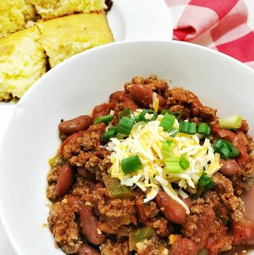 the best slow cooker chili - served in a white bowl