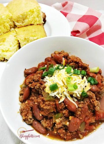 the best slow cooker chili - served in a white bowl