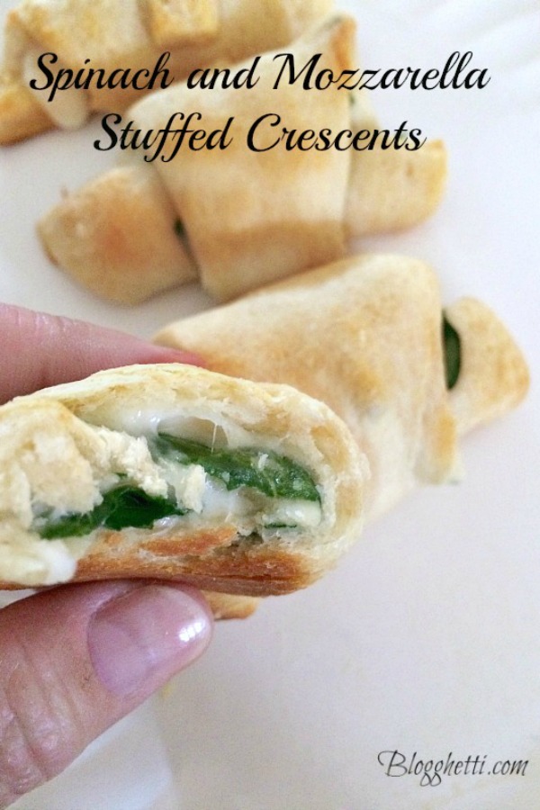 Light and fluffy crescents are loaded with cheese and spinach and make an easy appetizer or light lunch with a salad. #spinach #cheese #appetizer #crescents #meatlessmonday