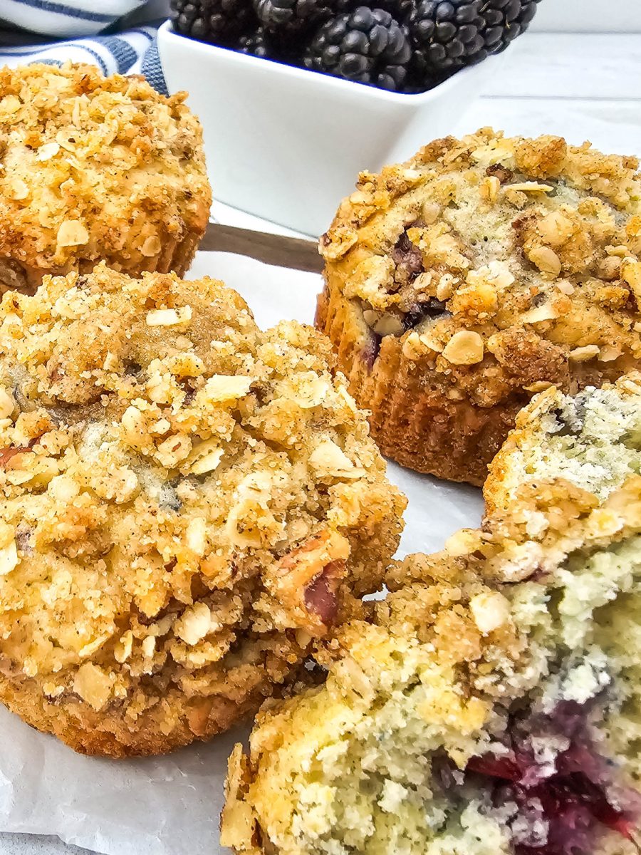 homemade blackberry streusel muffins on board