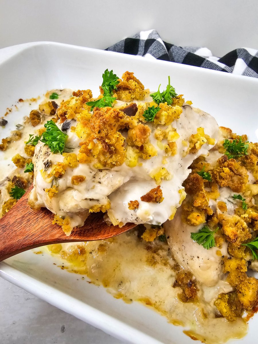 chicken and dressing served on wooden spoon