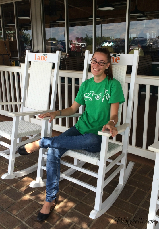 daughter relaxing in a rocking chair at Lane's Packing Plant