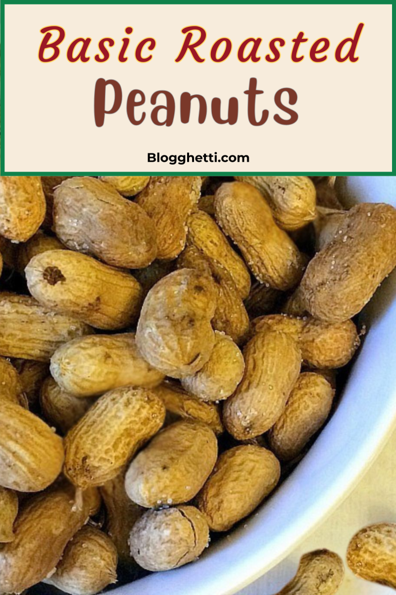 Close-up of roasted peanuts in shells in a white bowl, with the text "Basic Roasted Peanuts