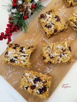 coconut and cranberry bars with shortbread crust