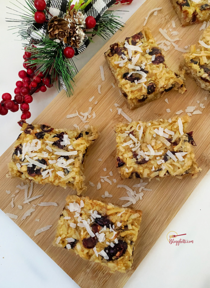 coconut and cranberry bars with shortbread crust