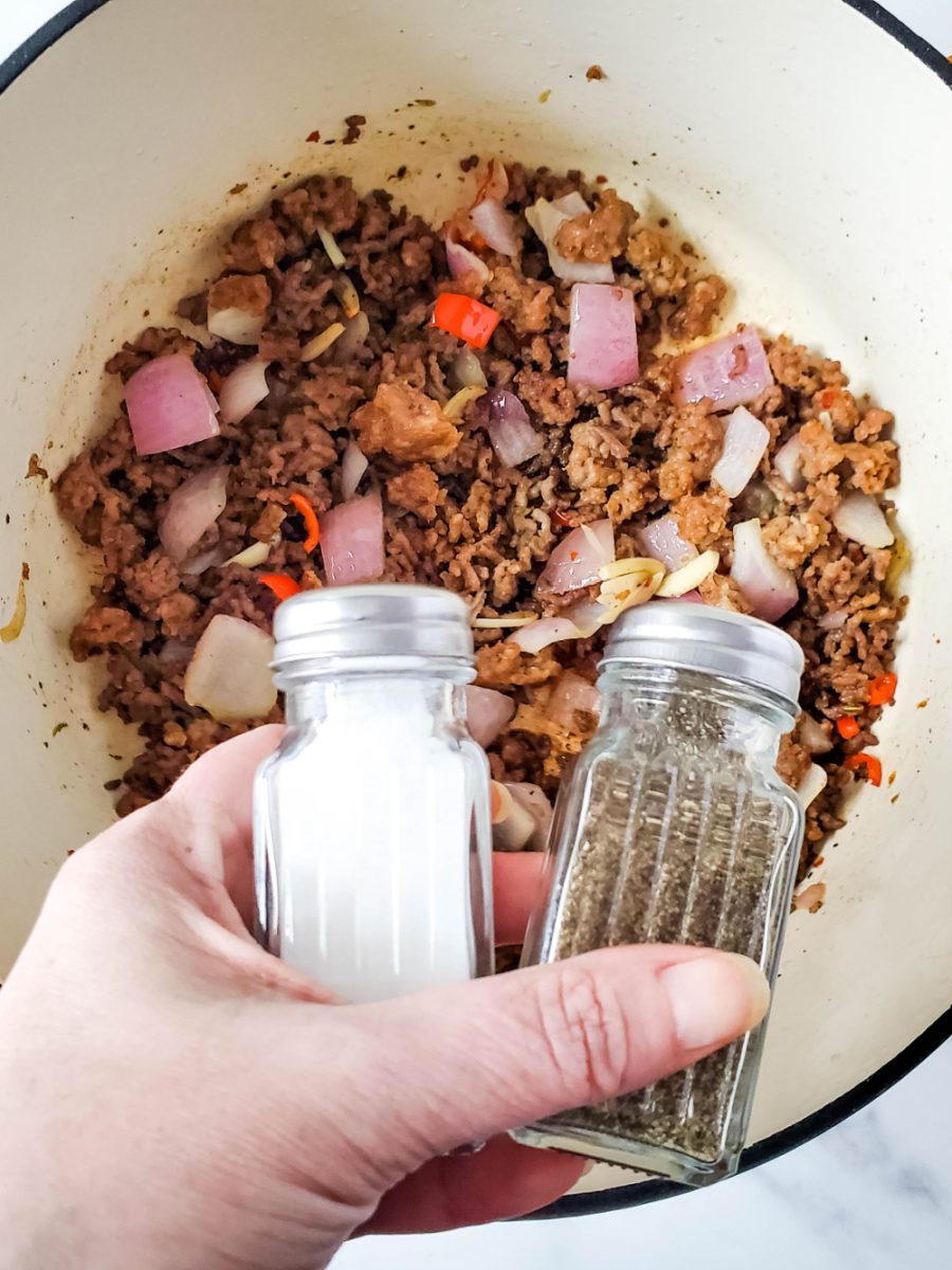 season meat mixture with salt and pepper