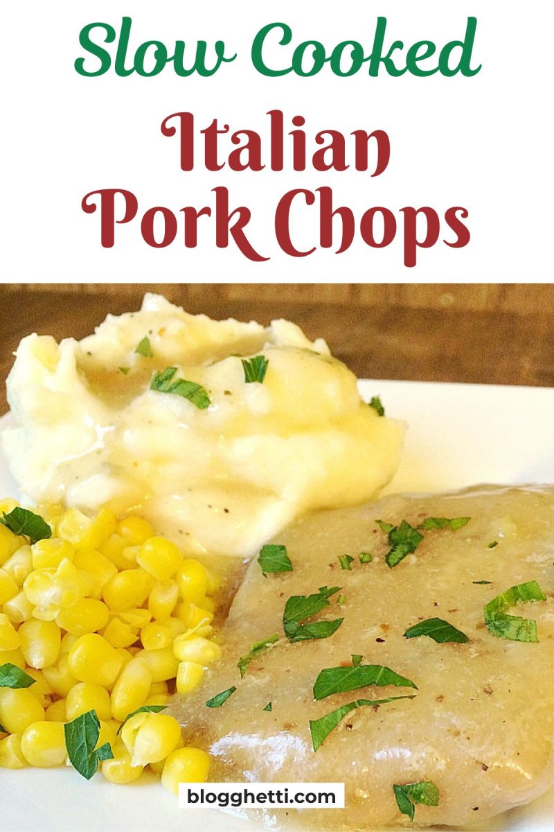 late of slow cooked Italian pork chops garnished with parsley, served with mashed potatoes and corn; overlaid text reads "Slow Cooked Italian Pork Chops
