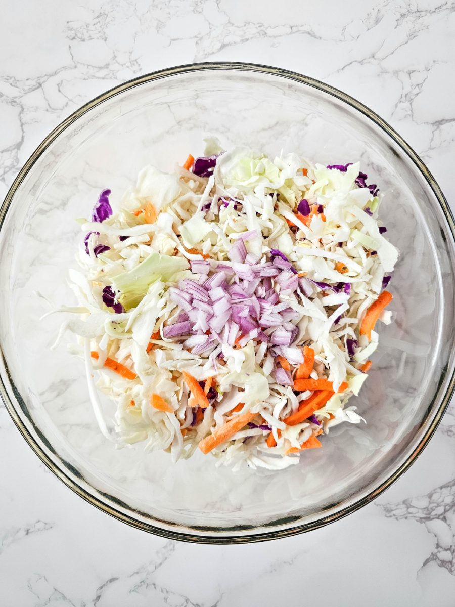 add coleslaw mix into bowl
