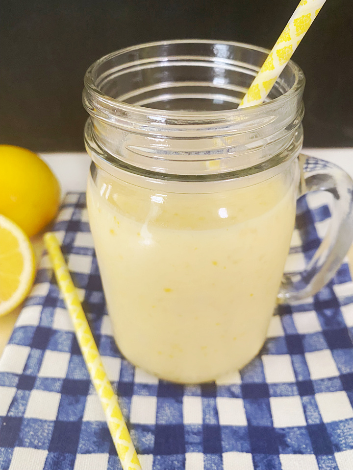 mason jar glass filled with smoothie