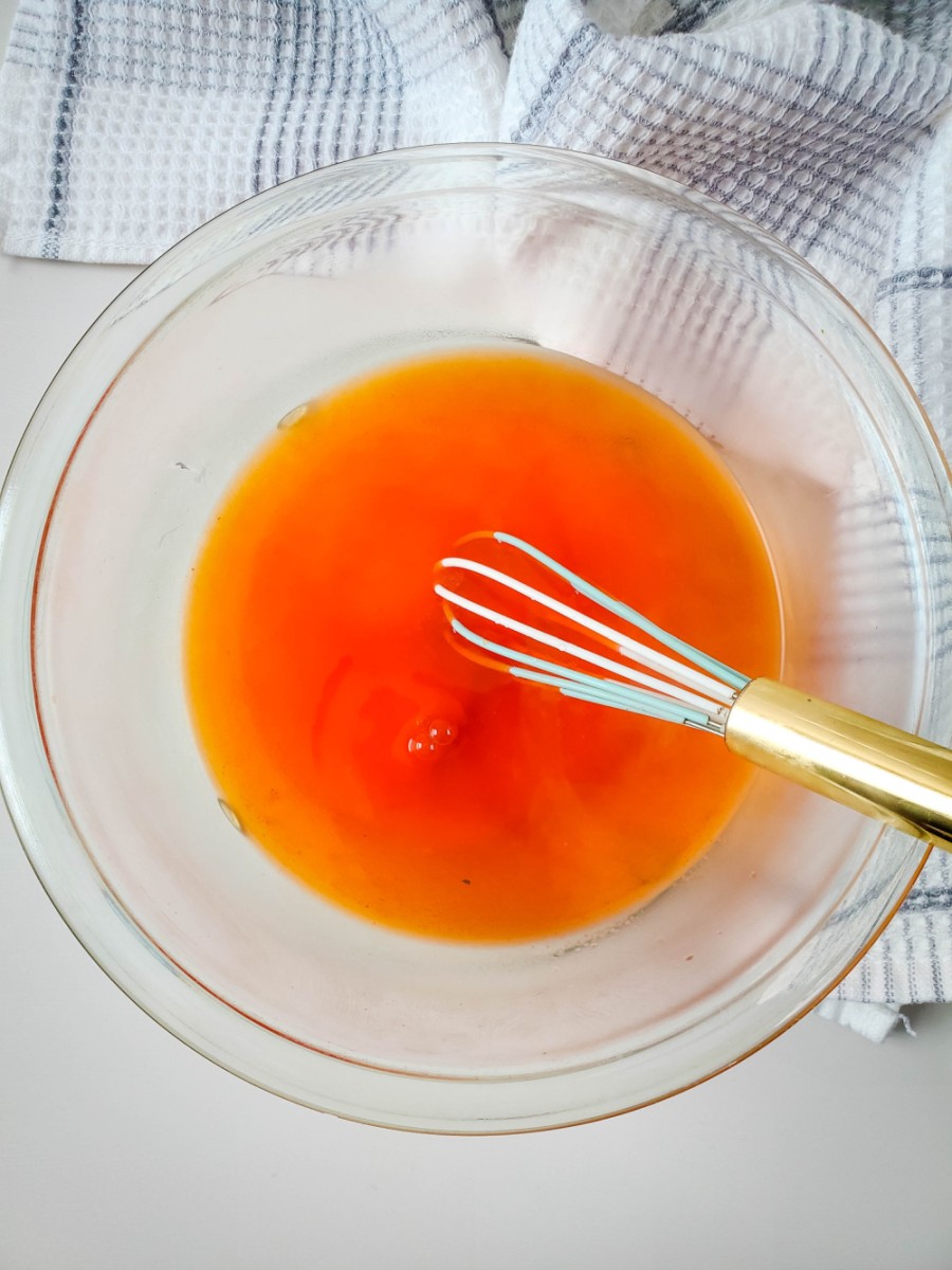 dissolve jello in boiling water in bowl