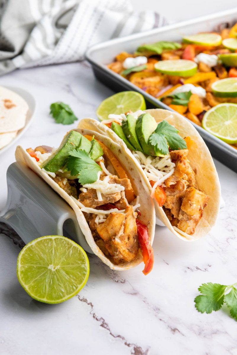 2 chicken tacos in flour shells