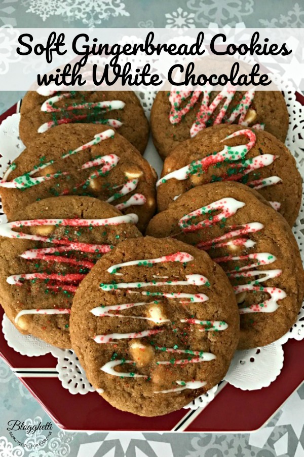 Soft gingerbread cookies with white chocolate chips on plate