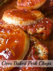 The simple glaze on these Oven Baked Pork Chops add so much flavor to the otherwise boring pork chop. The sauce is a mixture of brown sugar, ketchup, and Dijon mustard. It makes the most delicious glaze and that thick slice of onion bakes on top of the pork chops perfectly.