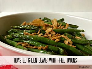 Roasting Green Beans with garlic and a bit of olive oil takes the vegetable to a whole new level and when topped with crunchy fried onions, they are the perfect side dish for any meal.